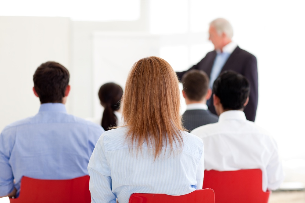 Senior-manager-giving-a-presentation-in-the-office