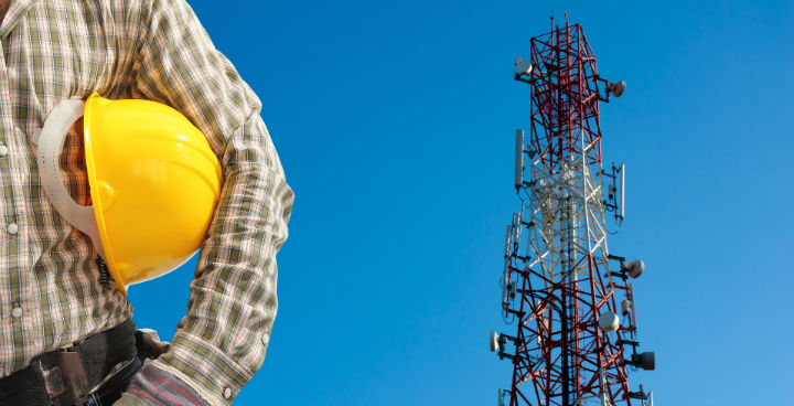 field tech working on tower